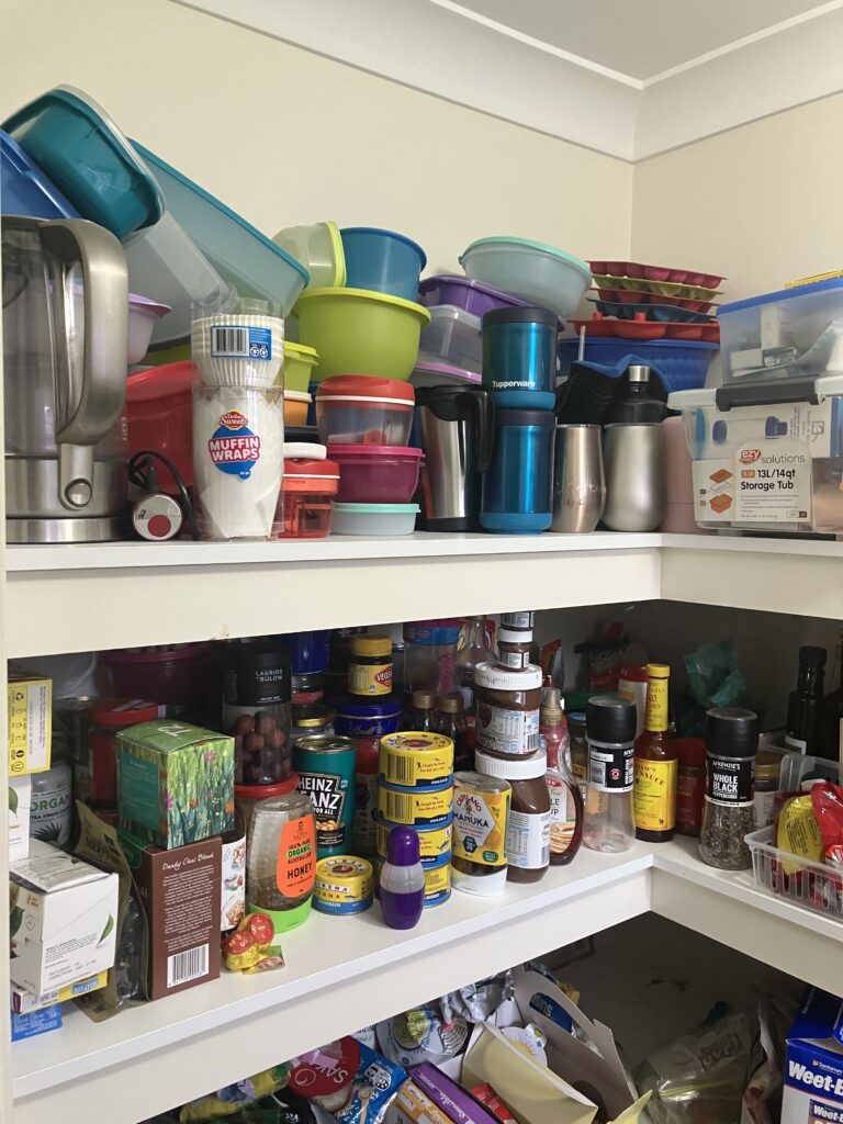 Cluttered walk-in pantry