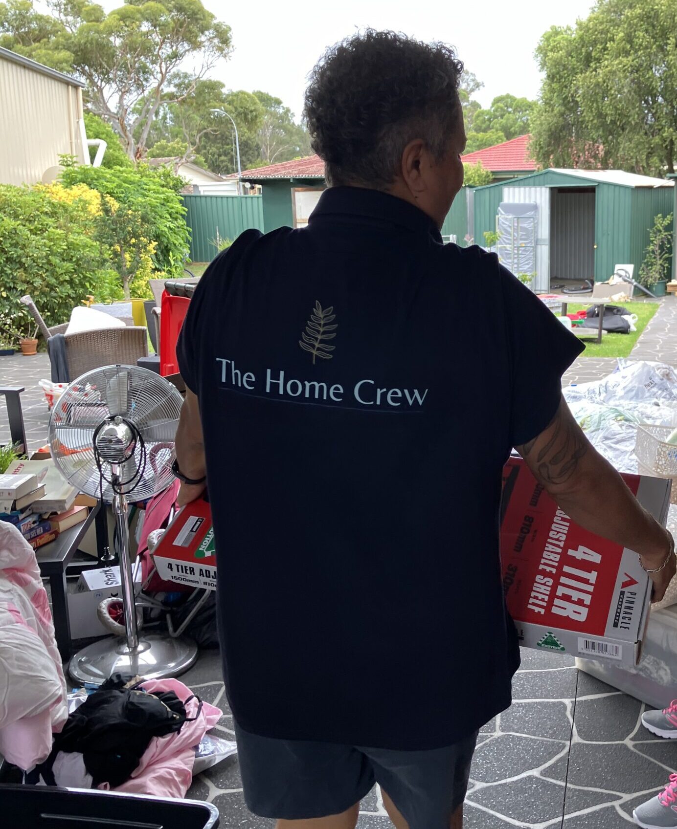 Frankie Taylor from The Home Crew Concierge Services in the process of decluttering